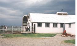 Photo of the stables and arena
